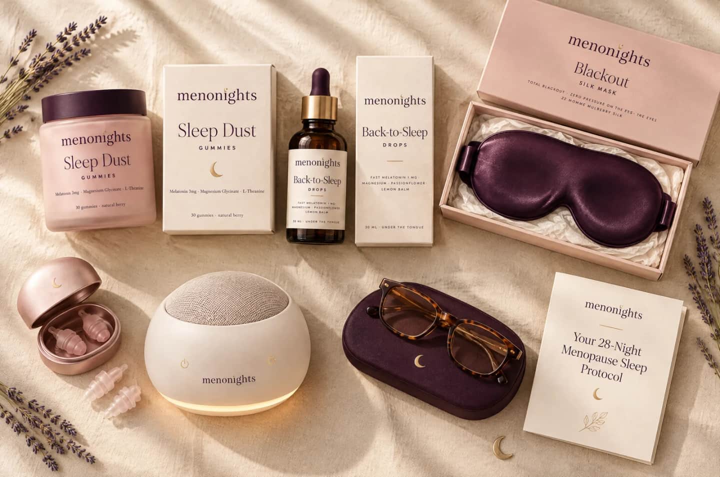 The MenoNights sleep kit laid out: MenoDust Sleep Gummies, MenoDrift Back-to-Sleep Drops, the MenoShade Silk Mask, the MenoHush Sound Machine and the MenoDusk Blue-Light Glasses